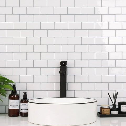 Bathroom sink with Upgraded Peel And Stick Subway Tile Backsplash Kit 10 Self Adhesive 12 Inch Square White Tiles Realistic 3D Texture.