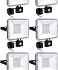 100W Led Floodlights with Motion Sensor, 6000K-6500K Daylight White 80, six units mounted on supports with motion sensors