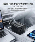 Ultra Compact 100W Power Inverter With Wicked Quiet Fanless Design in car cup holder with laptop and phone charging.