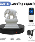 Heavy Duty Remote Controlled Motorized Turntable With Speed Adjustment For Professional 3D Scanning And Showcase Photography Rotating Platform That Handles Massive Loads Up To 400 Pounds Smoothly with remote and elephant sculpture.