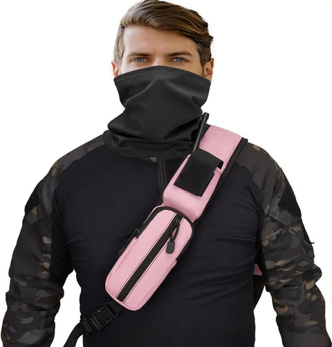 Person wearing a pink Tactical Sling Crossbody Bag With Moveable Universal Holster 15L Capacity, dressed in outdoor attire