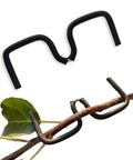 3.1 Inch Fruit Tree Limb Spreader Set, 20 Pieces Branch Puller Tools With Plastic Hose Wrapped Iron Wire in use on a branch
