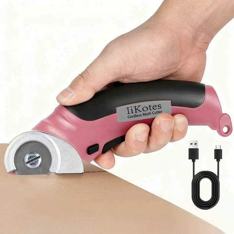 Heavy Duty Cordless Electric Scissors With Fast Usb Rechargeable Power And Self Sharpening Steel Blades For Slick Cuts Through Denim Fabric Leather Carpet And Stubborn Cardboard In Nifty Pink, cutting through cardboard.