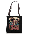 Survivor Dragon Boat Racing Tote Bag For Paddlers And Teams, featuring dragon graphic, durable fabric, wide 14-inch straps for gear.
