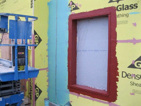 Construction site with window sealed by FastFlash Fluid Applied Flashing Membrane For Windows Waterproof And Airtight Pro Grade Sealant