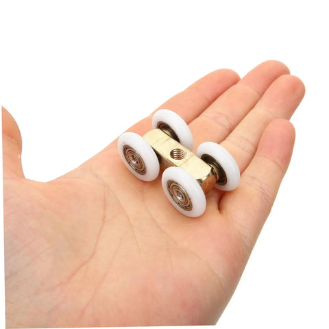 Replace Rattling Janky Doors Fast With Heavy Duty Sliding Rollers Whisper Quiet Track Pulleys For Barn Cabinet Glass Doors Adjustable Glides in hand.