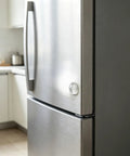 12 Piece Cabinet Door Stopper Kit And Fridge Bumper Pads With Super Strong Self Adhesive For Peaceful Rooms on a stainless steel fridge.