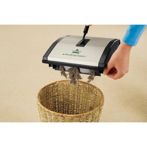 Lightweight Manual Carpet And Hard Floor Sweeper Featuring Dual Rotating Brush Roll Plus Corner Edge Brushes collecting pet hair.
