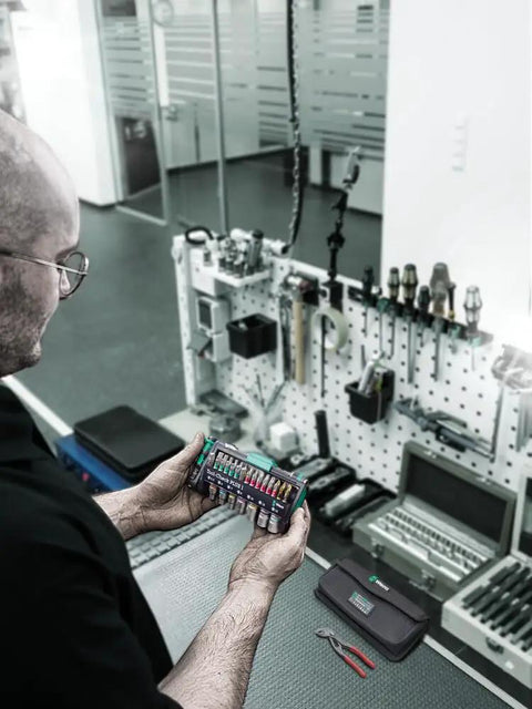 Person holding Your Go To 40 Piece Tool Check Combi Set For Manual And Machine Use With Zyklop Mini 1 Quarter Inch Bit Mounting