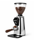 Premium Top Tier Stainless Steel Electric Burr Coffee Grinder With 64mm Burrs And Programmable Timer For Dead On Dose Control Bright LED Display single pack with coffee beans.