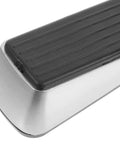 2 Pack No Drill Door Stop Wedges For Home And Office, Heavy Duty Zinc Alloy And Rubber close-up of silver and black wedge design