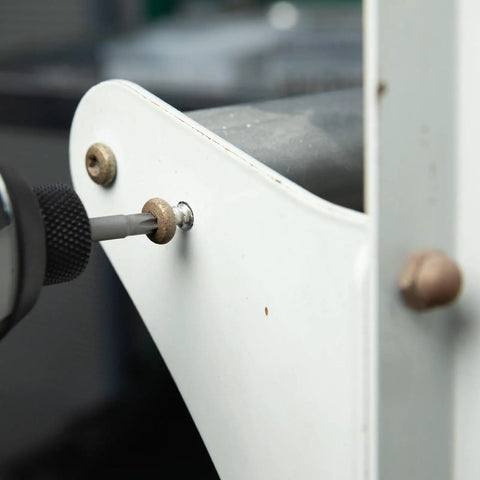 Person using 2 Inch Magnetic T30 Torx Bits Set With One Quarter Inch Hex Shank, S2 Steel Screwdriver Bits, on a white surface.