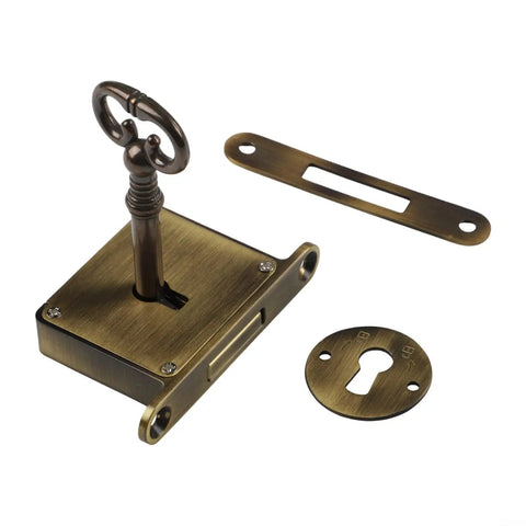 Vintage Brass Drawer Lock With Key For Cabinets And Desks showing antique style latch with keyhole in gold bronze finish