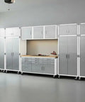 Heavy Duty 12 Piece Steel Garage Cabinet Storage Sets Featuring Lockable Rolling Workbench And Wall Cabinets in a spacious workshop.