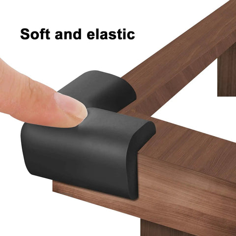 Built Tough Yet Soft Black Foam Corner Protectors Four Pack Pre Taped Rubber Edge Guards For Beds Tables And Desks on a table corner.