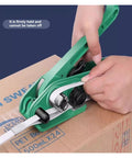 Heavy Duty Manual Strapping Machine Kit with Tensioner And Sealer For Pet And Pp Plastic Banding Up To Three Quarters Inch Wide in use on cardboard.