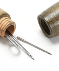Wooden needles container with metal needle and threader from Leather Stitching Machine Hand Sewing Tool For DIY Crafts Handy And Pro Grade Portable Leather Sewing Device For Home And Shop Use Easy To Use Durable Stitching Kit For Repairs Custom Leather Projects And Quick Fixes
