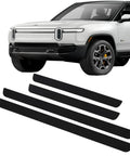 Badass Level Stainless Steel Door Sill Scuff Plate Guards For Rivian R1S R1T R2 Four Piece Entry Step Pad Trim displayed with Rivian SUV.