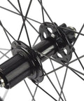 Close-up of six bolt rotor hub on Carbon Disc Wheelset 50C-23 Clincher Road Wheel 12x100 Thru Axle Built For Speed.