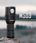 Ultra Bright EDC Flashlight 13000 Lumens, Rechargeable Pocket Light on rocky surface, compact design, emergency prep