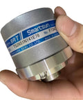 Close-up of TS2651N141E78 Servo Motor Incremental Encoder held in hand, showing label and construction for CNC and automation use.