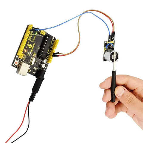 Two Pack 24V Electric Lifting Magnet With 8 Kg Pull in use with a circuit board setup