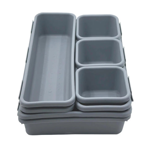 8 Piece Interlocking Drawer Organizer Trays Set In Light Gray Plastic, Modular Storage Bins stacked, non-slip surface visible