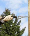 5-In-1 Impact Socket Kit Heavy-Duty With 3/4 Inch 1 Inch And 1-1/8 Inch Square Sockets in use, attaching hardware to wooden utility pole.