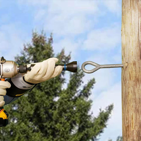 5-In-1 Impact Socket Kit Heavy-Duty With 3/4 Inch 1 Inch And 1-1/8 Inch Square Sockets in use, attaching hardware to wooden utility pole.