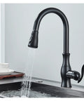 GAZOGJ Black Kitchen Faucet Pull Down Sink Mixer Tap 360°Rotation with water flow, stylish black design for modern kitchens.