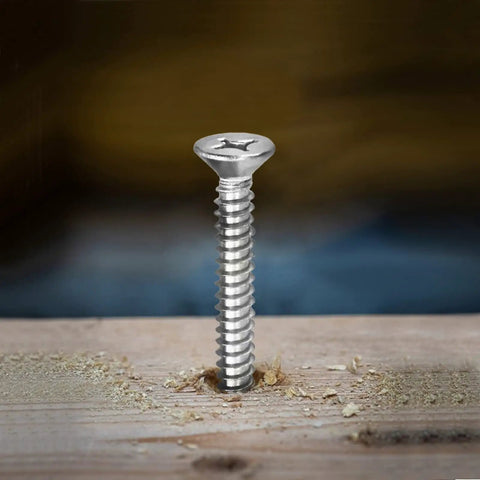 Close-up of a #12 gauge 5/8 inch flat head Phillips wood screw, premium 304 stainless steel self-tapping drywall fastener.