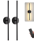 Modern Cordless Wall Sconces Set Of 2 With Remote And Touch Dimming Rechargeable Battery Operated Led Lights For Bedroom Hallway 3000k To 6000k Sleek Black Metal mounted on wall with remote in hand.