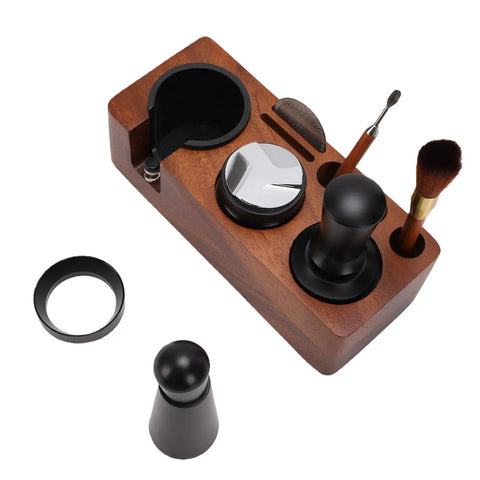 Portable Solid 58mm Stainless Steel Coffee Tamper Kit With Wooden Tamping Station Needle Tool And Quick Clean Brush on a wooden base.