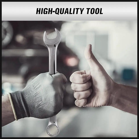 A gloved hand holding a wrench from the Pro Grade 32-Piece Combination Wrench Set SAE And Metric; another hand gives a thumbs up.