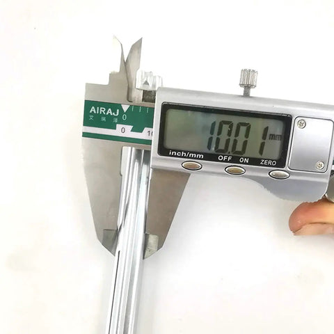 Caliper measuring a drawer slide, showing 10.01mm width, part of the Two Pack Medium Soft-Close Ball Bearing Drawer Slides