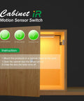 Smart Auto On Off Cabinet Light Sensor Switch For 12V 24V DC LED Lights IR Switch installed in an open cabinet showing LED light on.