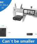 Coin Sized Hidden Spy Camera With 1080P HD WiFi next to caliper showing 31.27 mm size, highlighting ultra compact security camera dimensions.