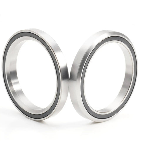 Ride Smooth With This Bike Headset Bearing Set 40 X 52 X 7 Mm Sealed Grease Packed 45/45 Degree Balls For 1-1/2 Inch Headset Repair Parts Pack Of 2 Durable, showing two silver bearings