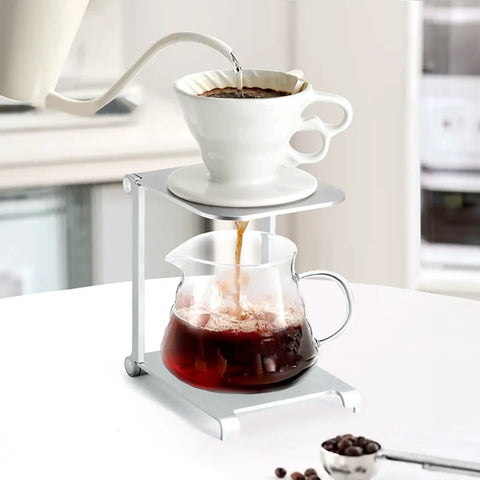 Straight Up Solid Folding Coffee Stand For Manual Espresso Machines Portable Aluminum Brewing Bracket pouring coffee into glass.