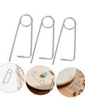 Ditch The Loose Ends With These Cool Nolis Spring Pins, Stainless Steel Quick Lock Clamps For Garden Hooks And Heavy Machinery Tasks That Stay Put, displayed in silver.