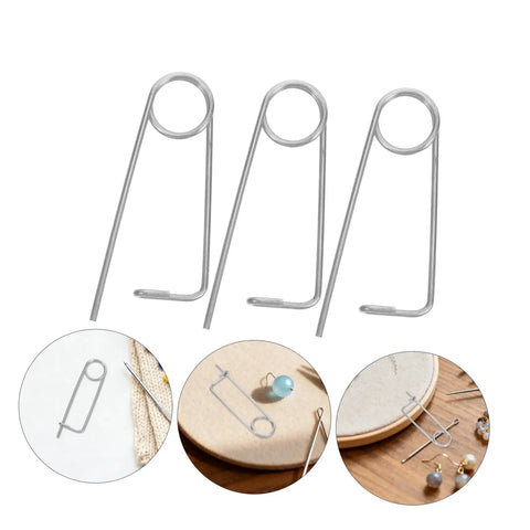Ditch The Loose Ends With These Cool Nolis Spring Pins, Stainless Steel Quick Lock Clamps For Garden Hooks And Heavy Machinery Tasks That Stay Put, displayed in silver.