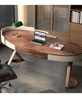 Top Shelf Ergonomic Standing Desk With Integrated Monitor Riser, Versatile Ash Wood Computer Table, oval shape with laptop.