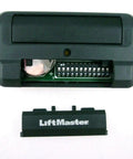 One Button Twelve Code Switch Commercial Gate Opener Transmitter Remote Controller with open switch panel and battery visible
