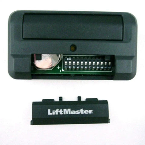 One Button Twelve Code Switch Commercial Gate Opener Transmitter Remote Controller with open switch panel and battery visible