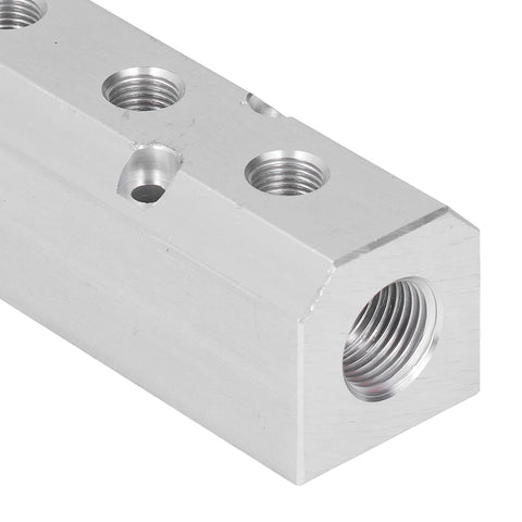 Close-up of Aluminum Pneumatic Manifold Block 40x40mm With G1/2 Inlet And G1/4 Outlet For Factory Automation And Auto Repair