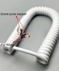 Close-up of Heavy Duty Coiled Power Cord 15 AWG Pure Copper Spiral Spring Extension Cable showing 2 core copper wiring.