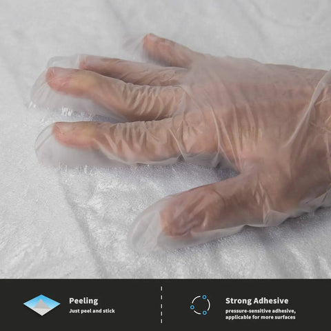 Hand demonstrating strong adhesive on 20 Pack 115 Sq Ft 3D Faux Brick Panels Peel And Stick White Wall Decor For DIY Friendly Renovation.