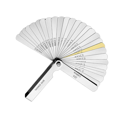 Front view of a 12-piece metal angle gauge block set fanned open with degree markings from 0.25° to 30°.