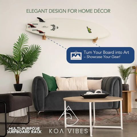 Premium Solid Oak Wood Surfboard Wall Mount Rack With Extra Accessory Hook holds surfboard as home decor above a stylish couch.