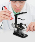 Person using LED Magnifying Lamp With USB Power For Soldering And Electronics Repair, Welding Clamp Light, hands-free magnifier.